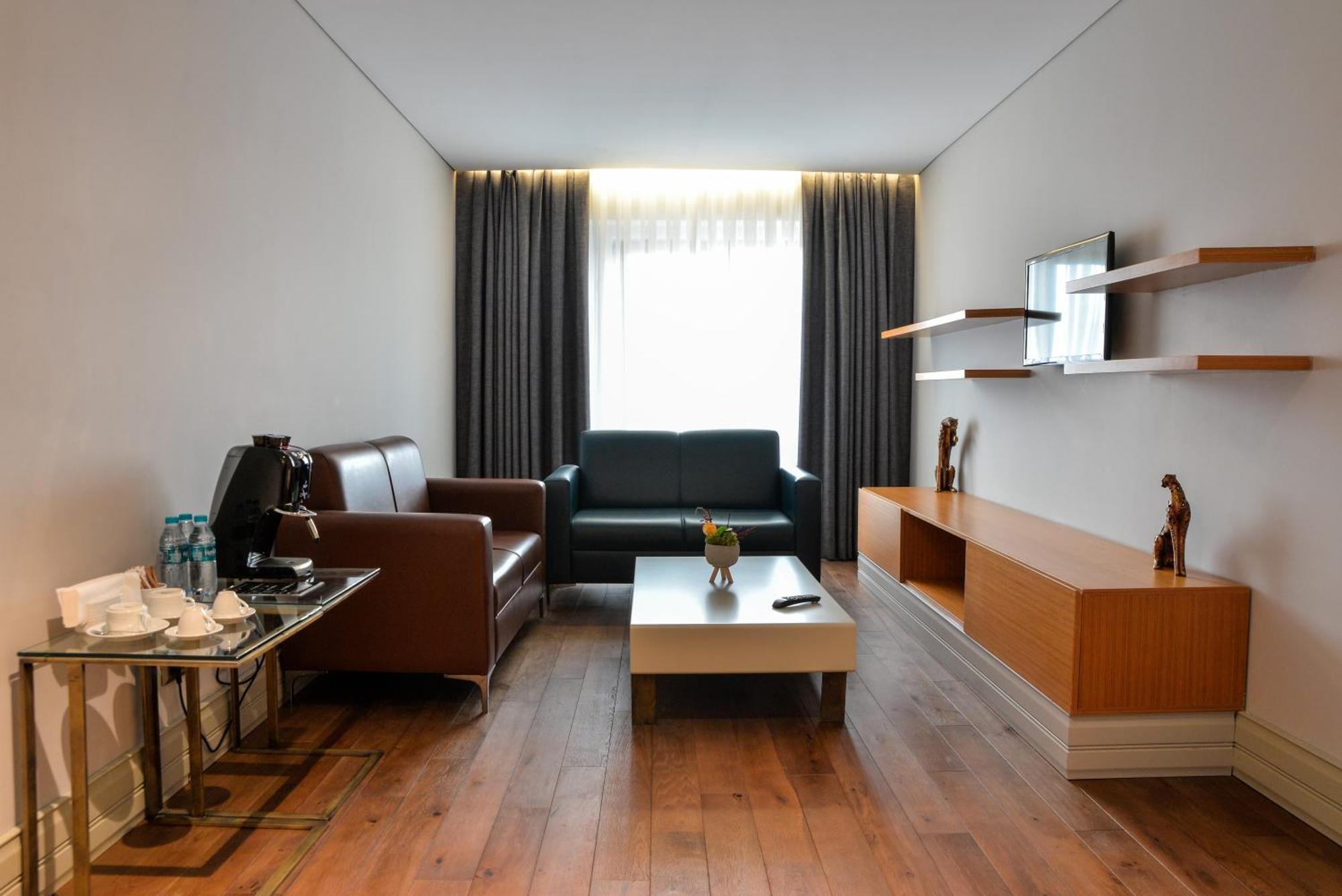 فندق اسطنبول غونين المظهر الخارجي الصورة A living room in a hotel
